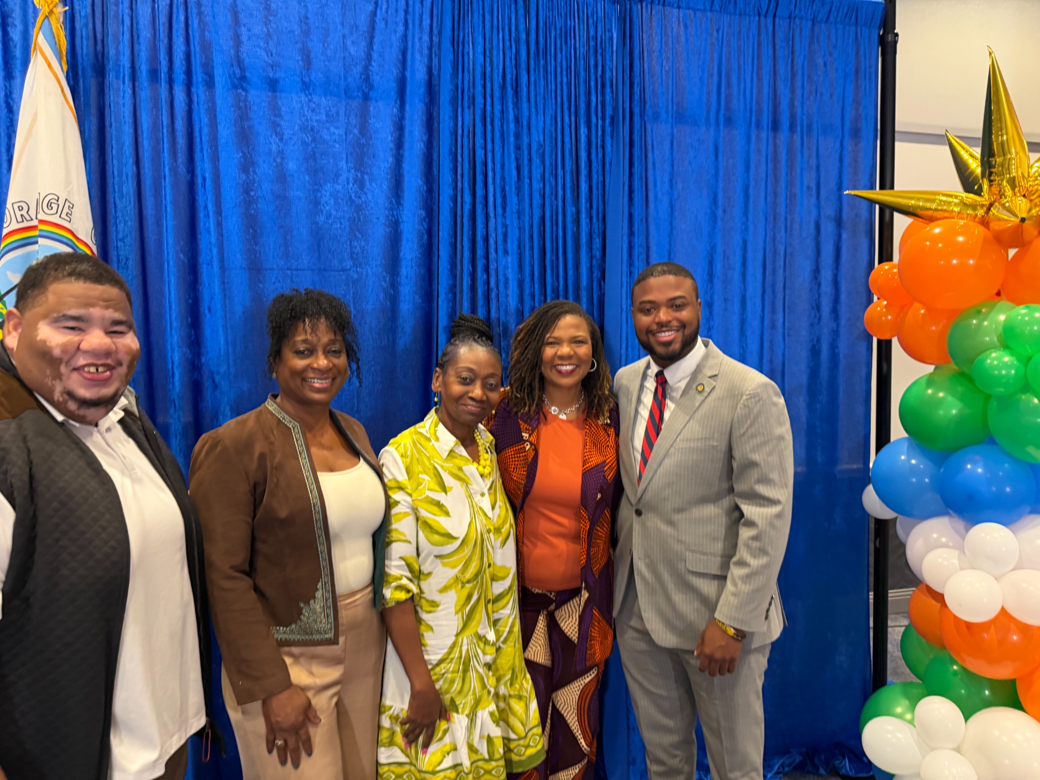 Julien with fellow community leaders at an event
